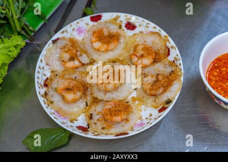 Plate of crispy fried shrimp tiny pancake- Banh Khot Stock Photo