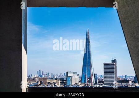 The London skyline with the iconic Shard building seen from the Tate Modern. Stock Photo