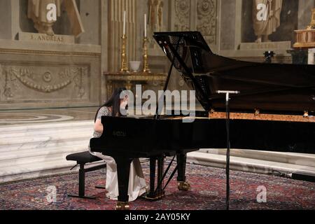 Rome, Italy. 13th Feb, 2020. Chinese-born Italian pianist Jin Ju performs at a concert held at the Quirinale Palace in Rome, Italy, Feb. 13, 2020. Italian President Sergio Mattarella hosted an extraordinary concert on Thursday, showing solidarity with the Chinese people dealing with the coronavirus emergency. Credit: Cheng Tingting/Xinhua/Alamy Live News Stock Photo