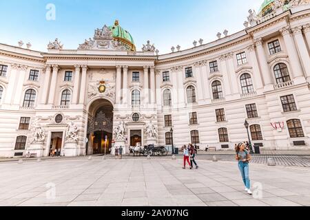 19 July 2019, Vienna, Austria: Famous Hofburg Palace gates view from Michaelerplatz square