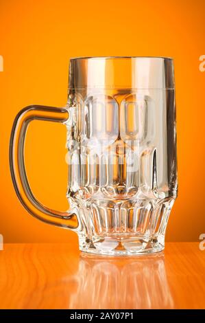 Beer glass against gradient background Stock Photo