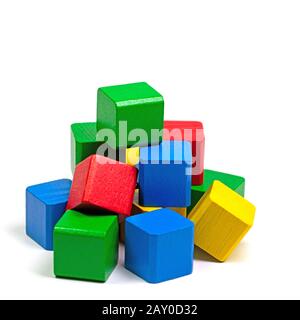 Colorful wooden toy blocks against white background Stock Photo