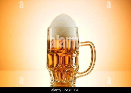 Beer glasses against the colorful gradient background Stock Photo