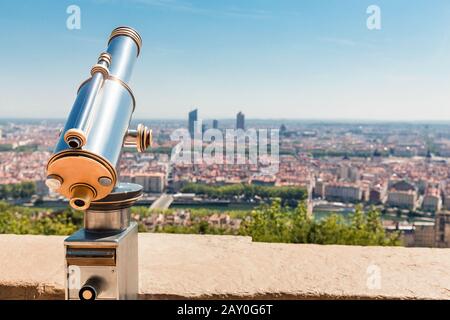 View point with tourist telescope in Lyon city in France Stock Photo