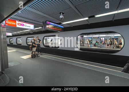 23 July 2019, Lyon, France: Passengers waiting for a train in a Metro Station in Lyon Stock Photo