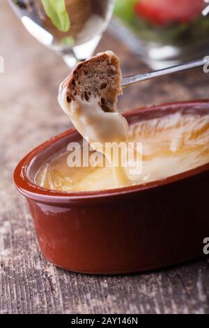 Bread and cheese fondue Stock Photo