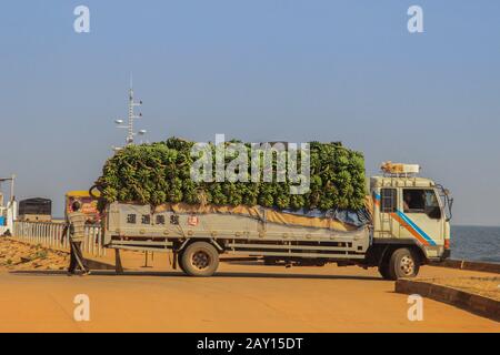 Kampala, Uganda - February 3, 2015: Transportation of bananas on a truck in the port of Jinja. Stock Photo