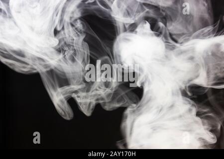 White smoke black background. Weap steam. Fog concept on dark. Stock Photo