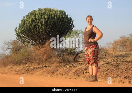 Fat naked woman standing against a white background Stock Photo - Alamy