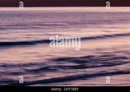 Breaking waves on the sea shore Stock Photo