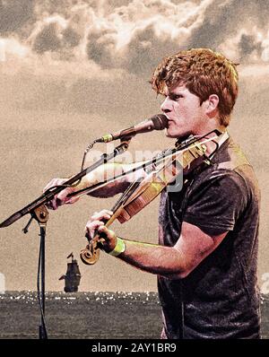 Seth Lakeman, folk singer and writer in a photo illustration image with sailing ship in background Stock Photo