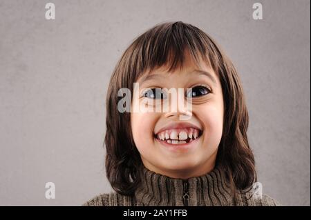 Schoolboy, series of clever kid 6-7 years old with facial expressions Stock Photo