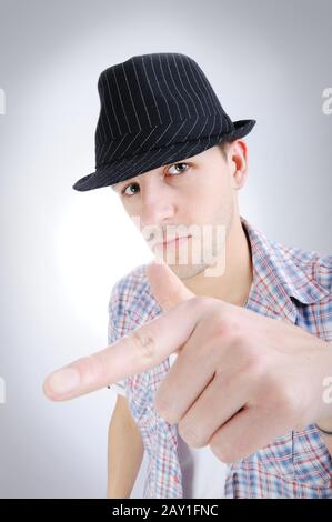 Trendy handsome young man with hat Stock Photo