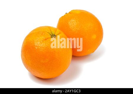 Fresh ripe oranges with useful vitamins isolated on white background. Stock Photo