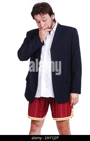A young male model in jacket and short pants Stock Photo