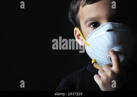 Little child with a mask on his face Stock Photo