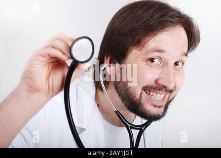 Young doctor using a stethoscope Stock Photo