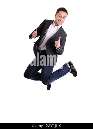 Celebrating success - Portrait of a excited male business executive jumping in air against isolated white background Stock Photo