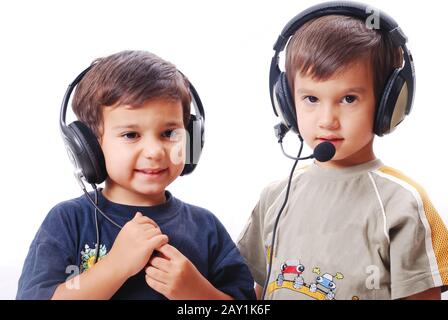 Two cute boys with headphones on Stock Photo