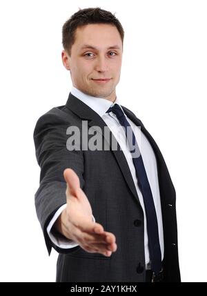 Business man extending hand to shake Stock Photo