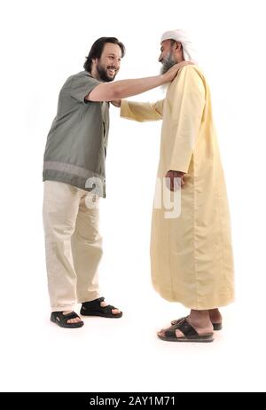 Arabic Muslim businessman person shaking hands Stock Photo