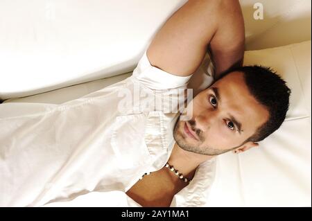 Young man relaxing at home Stock Photo