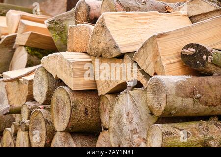 Close-up of a heap of firewood outdoors on a frosty winter day. Seen in Bavaria, Germany, in January Stock Photo
