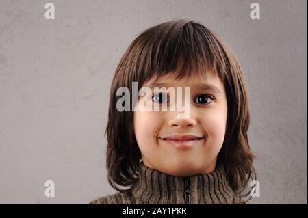 Schoolboy, series of clever kid 6-7 years old with facial expressions Stock Photo