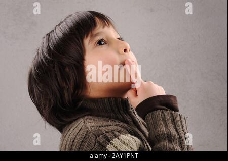 Schoolboy, series of clever kid 6-7 years old with facial expressions Stock Photo