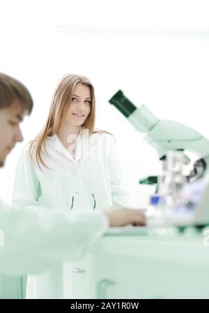 Researchers carrying out scientific research in a lab Stock Photo