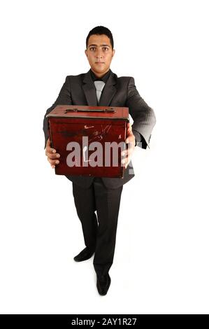 Businessman holding old briefcase Stock Photo