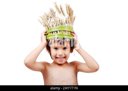Boy with wheat hat on head Stock Photo