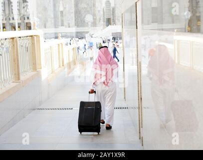 Arabic businessman walking Stock Photo