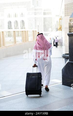 Arabic businessman walking Stock Photo