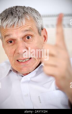Angry senior man Stock Photo