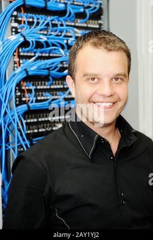 Administrator at server room Stock Photo