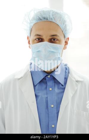 Doctor with a mask at hospital Stock Photo
