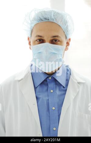 Doctor with a mask at hospital Stock Photo