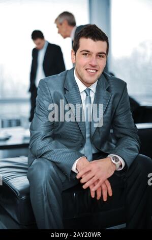 Young businessman at office meeting Stock Photo