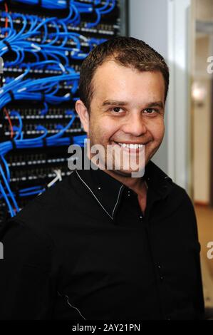 Administrator at server room Stock Photo