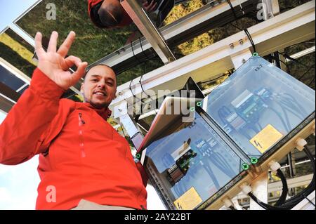 Engineer working with laptop installing  solar panels Stock Photo