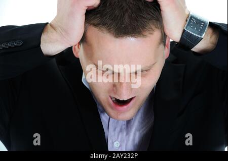 Young man having headache Stock Photo