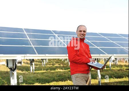 Engineer using laptop Stock Photo
