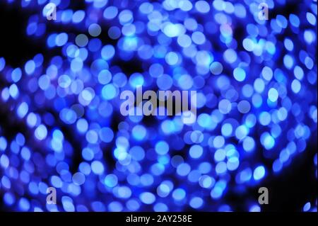 Photo of blurred Christmas lights at night Stock Photo