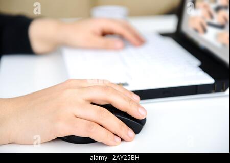 Hands on notebook Stock Photo