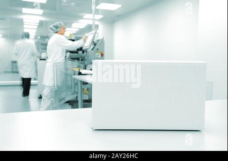 White box at automated production line at modern factory Stock Photo