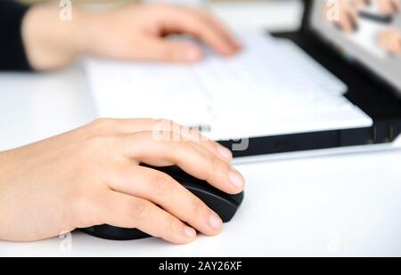 Hands on notebook Stock Photo