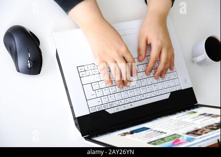 Hands on notebook Stock Photo