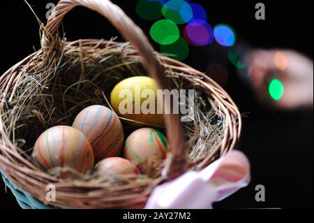 Easter eggs in basket Stock Photo