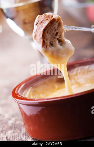 Bread and cheese fondue Stock Photo